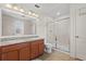 Bathroom features double sinks, granite countertops, and a glass enclosed shower for a luxurious feel at 13731 Bravante Aly, Windermere, FL 34786