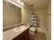 Bathroom with tub, shower, and double vanity at 13731 Bravante Aly, Windermere, FL 34786