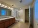 Well-appointed bathroom with double vanity and a large shower at 13731 Bravante Aly, Windermere, FL 34786