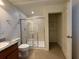 Clean bathroom with a walk-in shower and linen closet at 13731 Bravante Aly, Windermere, FL 34786