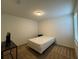 Simple bedroom with window and carpet at 13731 Bravante Aly, Windermere, FL 34786