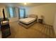 Spacious bedroom with large window and carpet at 13731 Bravante Aly, Windermere, FL 34786