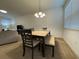 Bright dining room features a table with four chairs and bench seating at 13731 Bravante Aly, Windermere, FL 34786