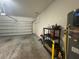 Garage with storage shelving and additional space at 13731 Bravante Aly, Windermere, FL 34786