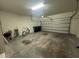 Attached garage with space for storage and a vehicle at 13731 Bravante Aly, Windermere, FL 34786