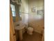 Clean half bathroom with pedestal sink and tiled floor at 13731 Bravante Aly, Windermere, FL 34786