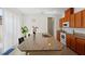 Modern kitchen with granite countertops, stainless steel appliances, and ample cabinet space for storage at 13731 Bravante Aly, Windermere, FL 34786
