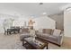 Open-concept living area that flows into the dining room and kitchen, ideal for entertaining and Gathering gatherings at 13731 Bravante Aly, Windermere, FL 34786