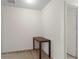 A minimal office with a wooden desk and neutral carpet at 13731 Bravante Aly, Windermere, FL 34786