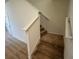 Carpeted staircase leading to the second floor at 13731 Bravante Aly, Windermere, FL 34786