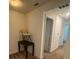 Upstairs hallway with access to bedrooms and bathroom at 13731 Bravante Aly, Windermere, FL 34786