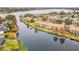 Waterfront community with canal views and various buildings at 1468 Patricia St, Kissimmee, FL 34744