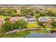 Aerial view of house near lake and highway at 1468 Patricia St, Kissimmee, FL 34744