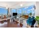 Open floor plan living room with hardwood floors and city views at 150 E Robinson St # 2512, Orlando, FL 32801