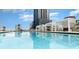 Relaxing rooftop pool with city views and cabanas at 150 E Robinson St # 2512, Orlando, FL 32801