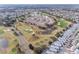 Aerial view of community near golf course at 1849 Dalton Dr, The Villages, FL 32162