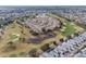 Aerial showing community layout near golf course at 1849 Dalton Dr, The Villages, FL 32162