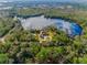 Aerial view of the house on a private lake at 1851 Grand Keahl Ln, Deltona, FL 32738