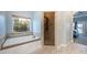 Luxurious Primary bathroom features a large soaking tub and walk-in shower at 1851 Grand Keahl Ln, Deltona, FL 32738