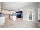 Bright kitchen featuring custom cabinets, granite countertops, stainless appliances, and aquarium feature at 1851 Grand Keahl Ln, Deltona, FL 32738