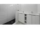 Bathroom boasts double vanity and a large walk in shower at 3065 Jon Jon Ct, Orlando, FL 32822