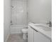 Modern bathroom with marble tile and a white vanity at 3065 Jon Jon Ct, Orlando, FL 32822