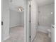 Clean bathroom with a bathtub, toilet and modern vanity at 3065 Jon Jon Ct, Orlando, FL 32822