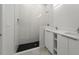 Spa-like bathroom with marble tile and double vanity at 3065 Jon Jon Ct, Orlando, FL 32822