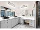 Modern bathroom with gray cabinets and black sinks at 3141 Oak Alley Dr, Apopka, FL 32703