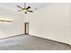 Bright bedroom with gray carpet and ceiling fan at 3141 Oak Alley Dr, Apopka, FL 32703