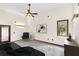 Main bedroom with gray carpet, large window and seating area at 3141 Oak Alley Dr, Apopka, FL 32703