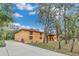 House with long driveway and mature trees at 3141 Oak Alley Dr, Apopka, FL 32703