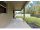 Covered patio overlooking fenced backyard at 3464 Julius Estates Blvd, Winter Haven, FL 33881