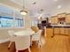 Kitchen and breakfast area featuring wood cabinets, stainless steel appliances, and hardwood floors at 38207 Sabal Way, Umatilla, FL 32784