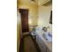 Bathroom with shower, toilet and vanity at 436 Avenue G Se, Winter Haven, FL 33880