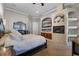 Luxurious main bedroom with fireplace and built-in shelving at 4500 Stone Hedge Dr, Orlando, FL 32817