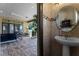 Convenient powder room with single sink vanity at 4500 Stone Hedge Dr, Orlando, FL 32817