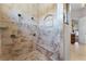 Large walk-in shower with dual shower heads and built-in seat at 4500 Stone Hedge Dr, Orlando, FL 32817