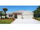 Inviting one-story home with stone accents and a two-car garage at 4940 Lyric Dr, Mascotte, FL 34753