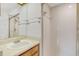 Small bathroom with shower and wood vanity at 5132 Lazy Oaks Dr # 5132, Winter Park, FL 32792