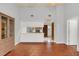 View of dining area, kitchen pass-through and hardwood cabinet at 5132 Lazy Oaks Dr # 5132, Winter Park, FL 32792