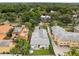 Aerial view of home with backyard lawn, patio and mature trees offering privacy and curb appeal at 528 Broadway Ave, Orlando, FL 32803