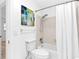 Simple bathroom featuring a toilet, bathtub, and shower at 528 Broadway Ave, Orlando, FL 32803