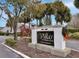 Community entrance sign for The Villas of Cypress Creek at 5429 Vineland Rd # S, Orlando, FL 32811