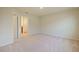 Bright bedroom with neutral walls and carpeted floors at 5650 Wooden Pine Dr, Orlando, FL 32829