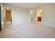 Spacious bedroom with access to a bathroom and hallway at 5650 Wooden Pine Dr, Orlando, FL 32829