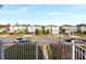 View of houses from a balcony, showcasing the neighborhood at 5650 Wooden Pine Dr, Orlando, FL 32829