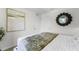 Bedroom with large window and mirror at 6022 Galloping Dr, Apopka, FL 32712