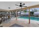 Relaxing pool area with covered patio and seating at 623 Yorkshire Dr, Oviedo, FL 32765