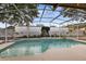 Inviting screened pool area, perfect for relaxation and entertainment at 623 Yorkshire Dr, Oviedo, FL 32765